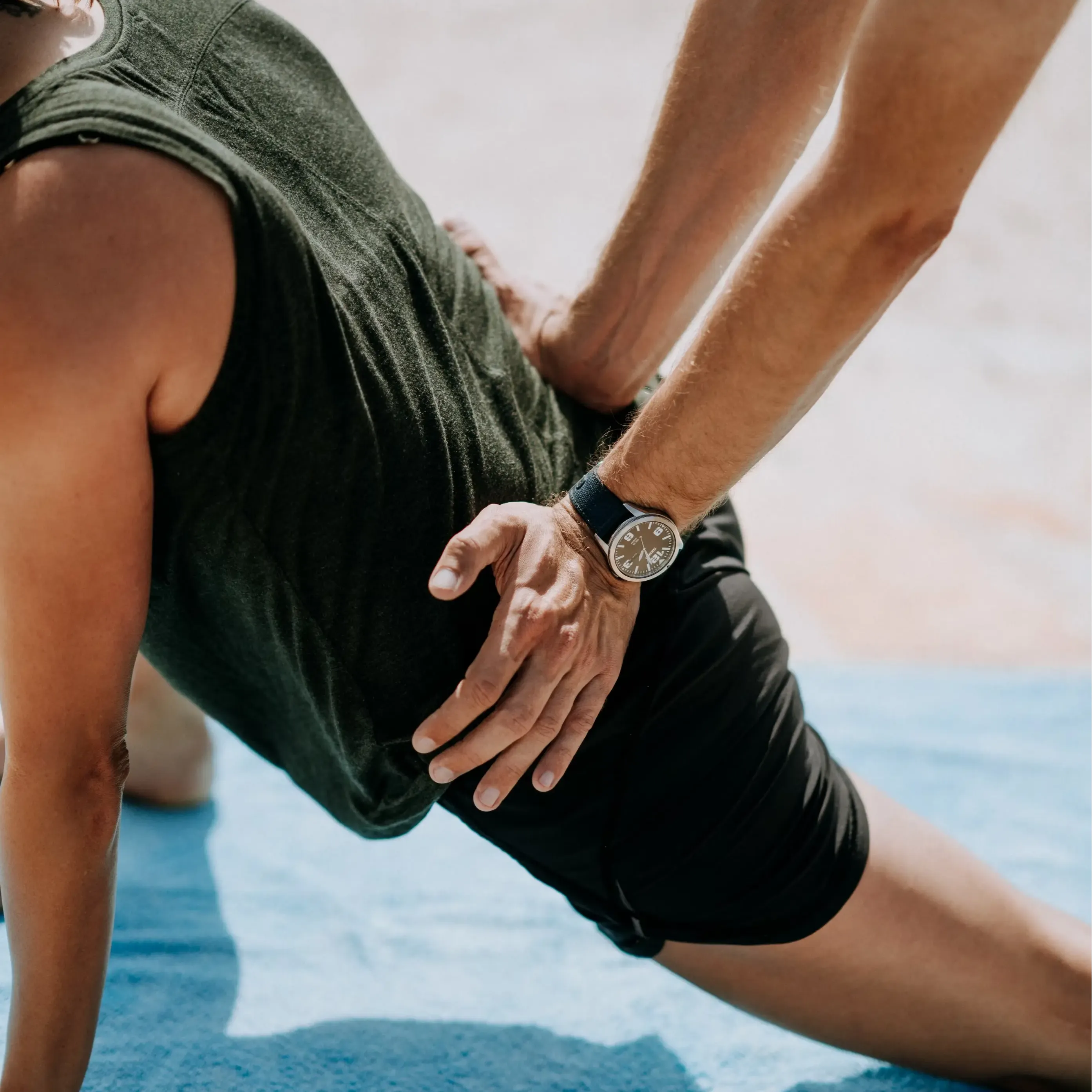 A client being guided on how to open up hip flexors